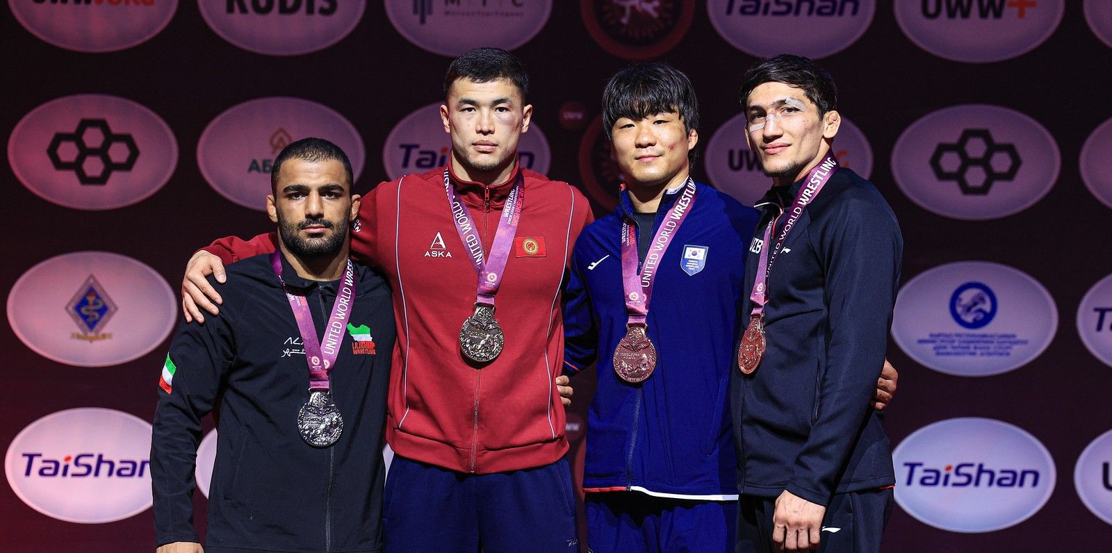 Podium 77kg GR - Gold_ Akzhol Makhmudov (KGZ), Silver_ Ali Zabihollah Oskou (IRI), Bronze_ Doniyorkhon Nakibov (UZB), Yeonghun Noh (KOR)_9607-X3.jpg